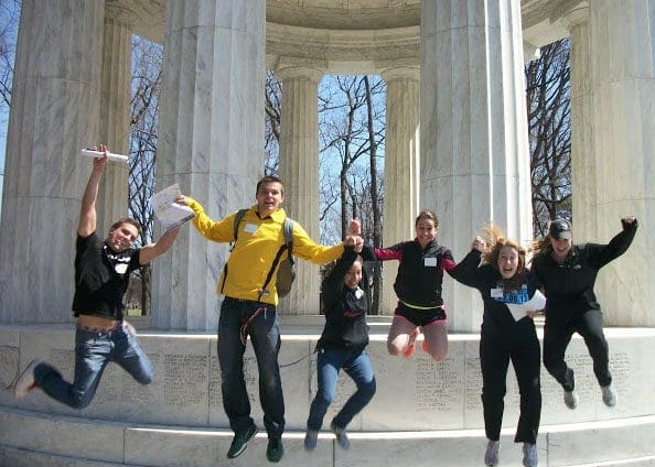 people jumping while smiling in DC