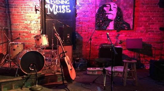 the stage with instruments set up at the evening muse venue